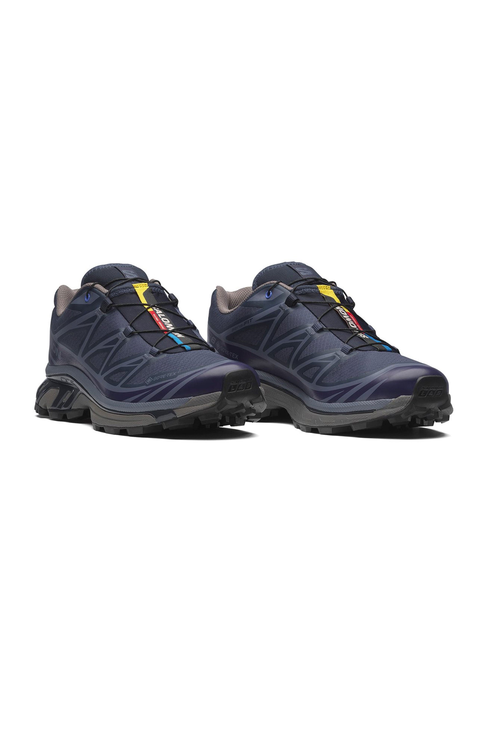 Happylifeshops Salomon blue hiking shoes with gray soles