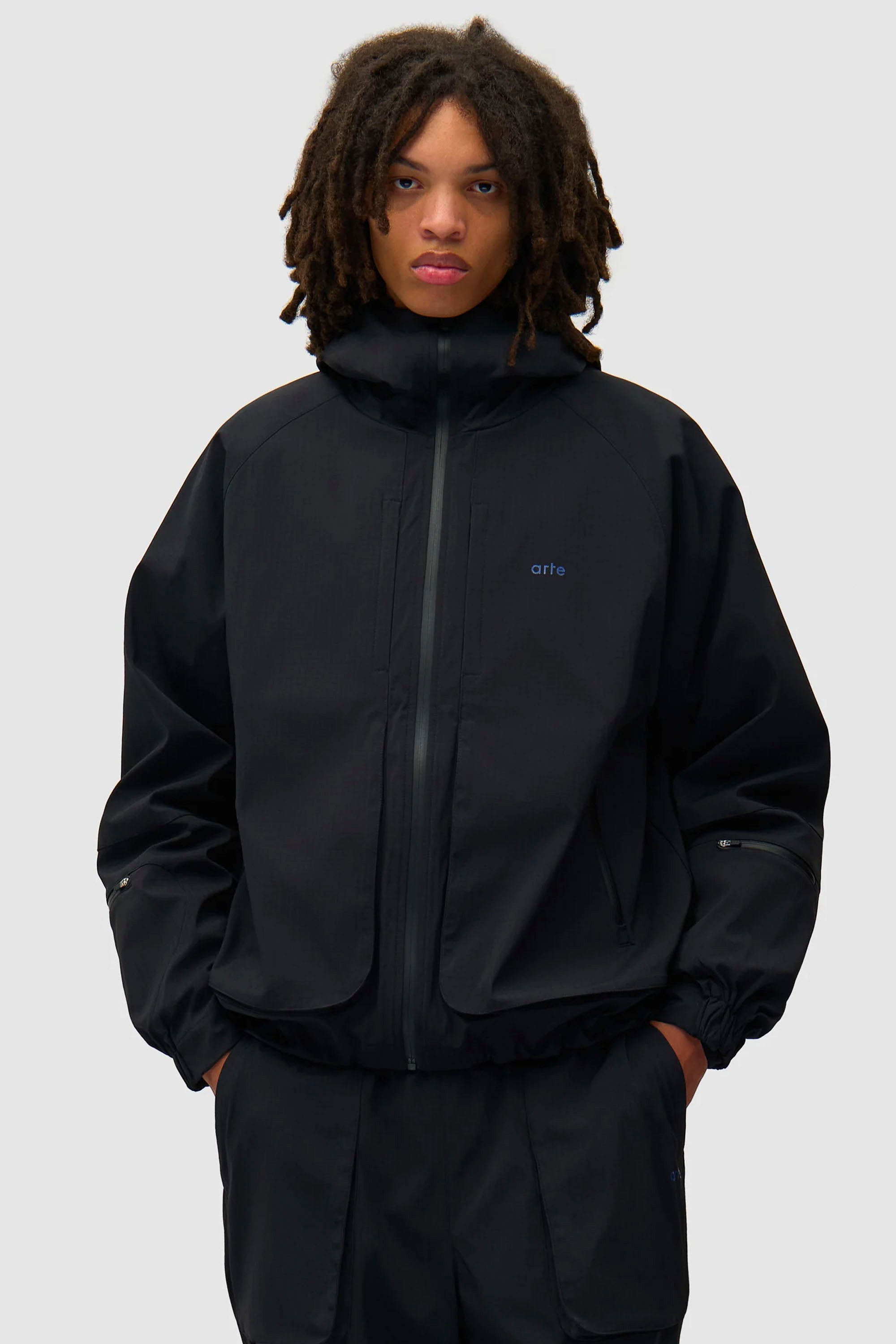 Happylifeshops Arte Antwerp reversible technical polar jacket black water-repellent inner fleece drawcord hem