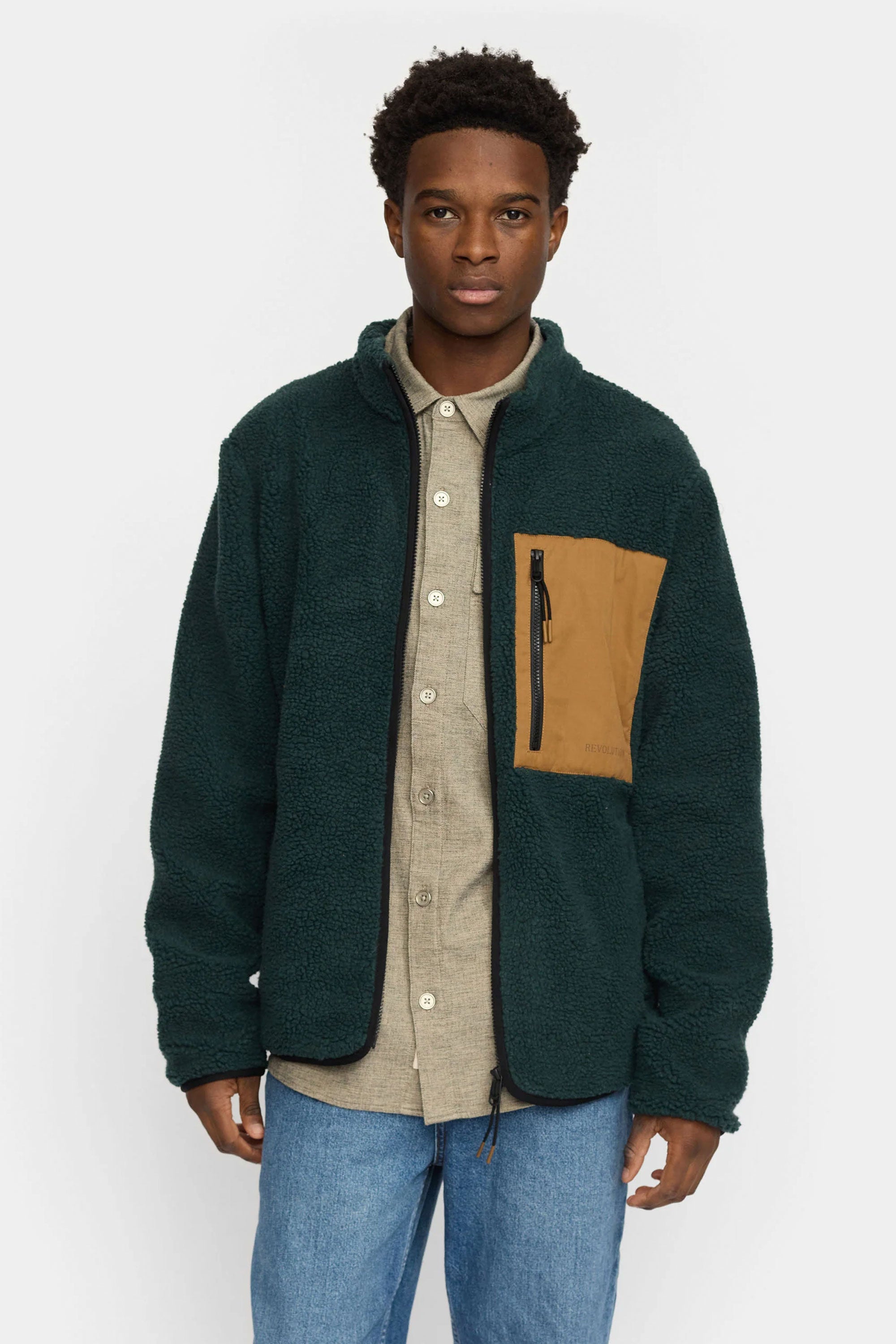Revolution dark green jacket with a brown patch Happylifeshops