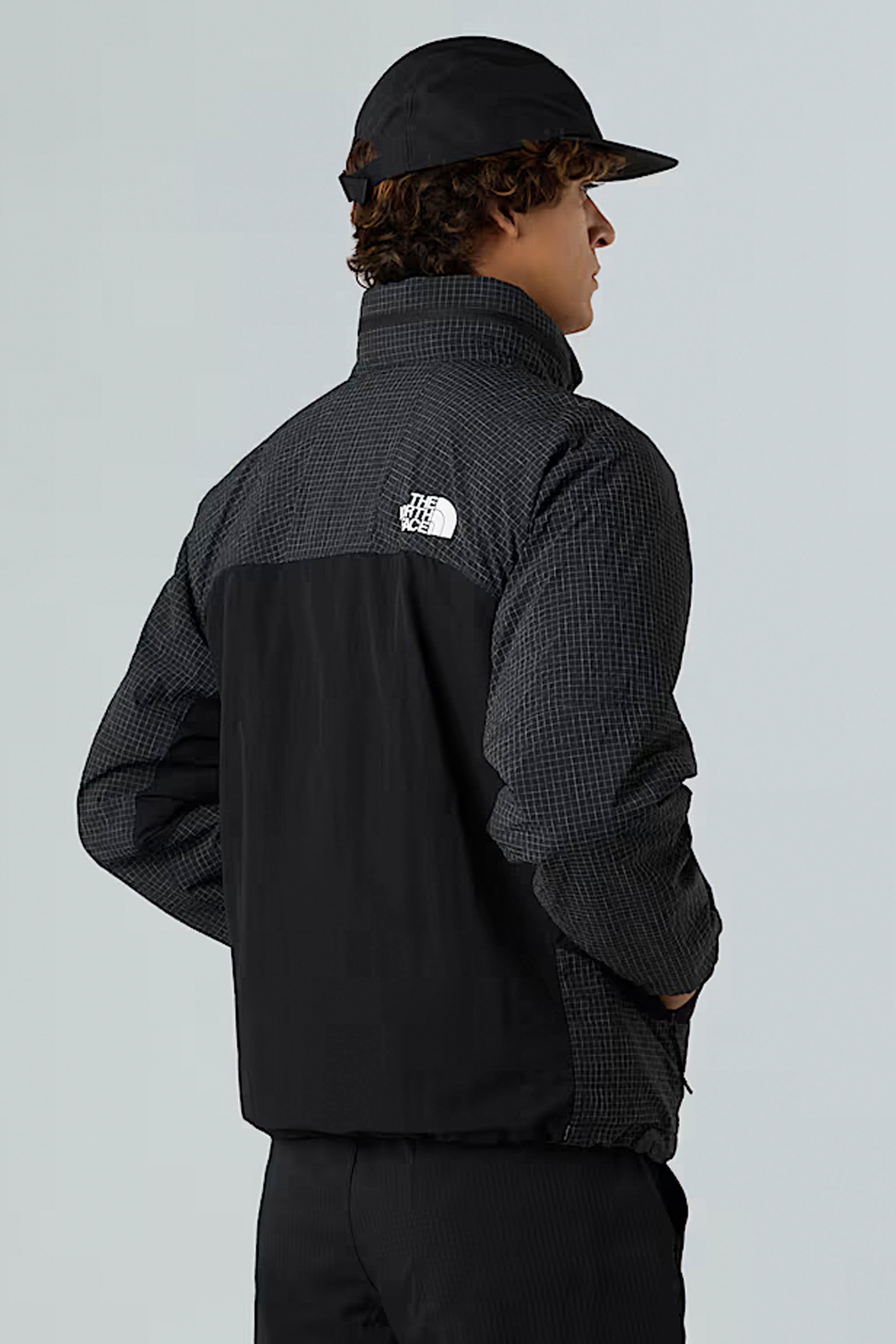 Happylifeshops The North Face Men’s HKe Utility Wind Jacket in TNF Black