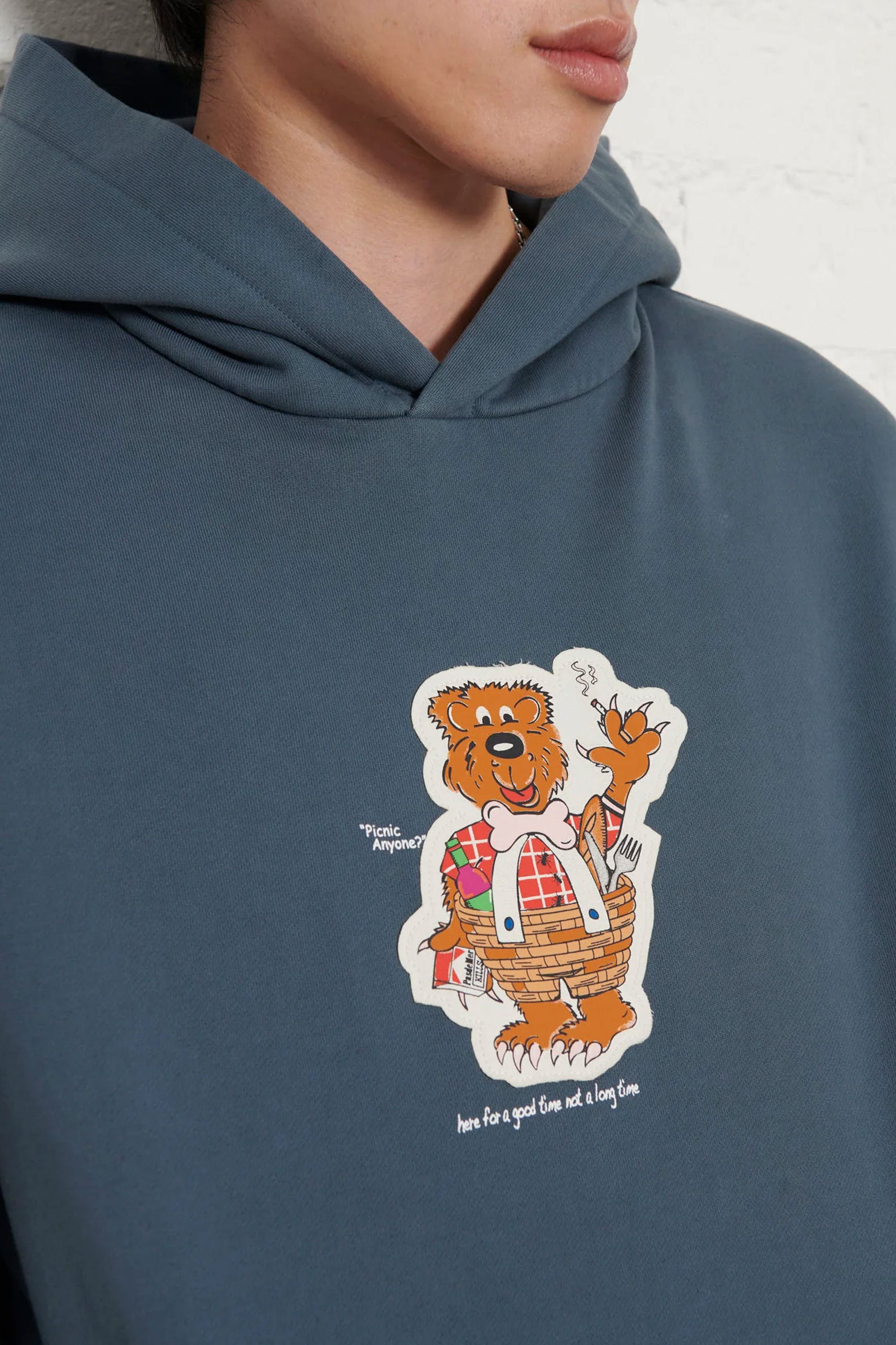 Pas de MerBlue hoodie with a cartoon bear design Happylifeshops 