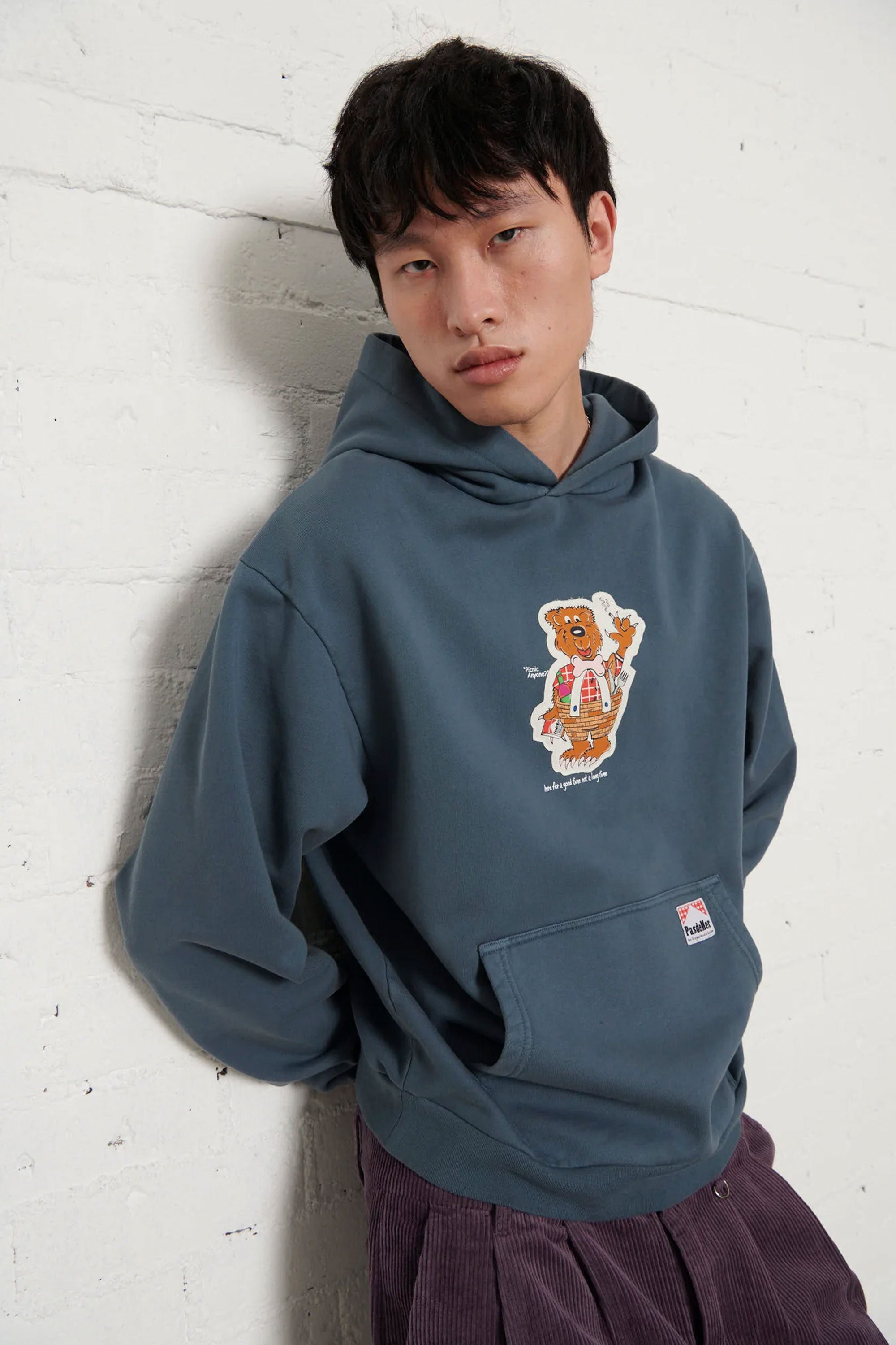 Pas de MerBlue hoodie with a cartoon bear design Happylifeshops 